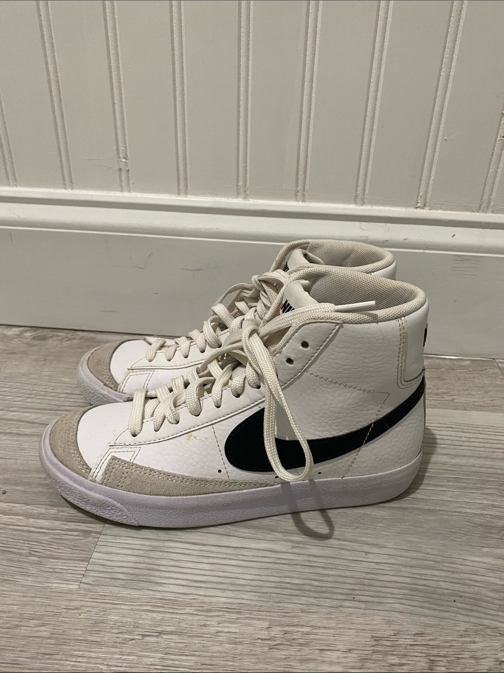Nike Kids High-Top Sneakers in White with Black Swoosh